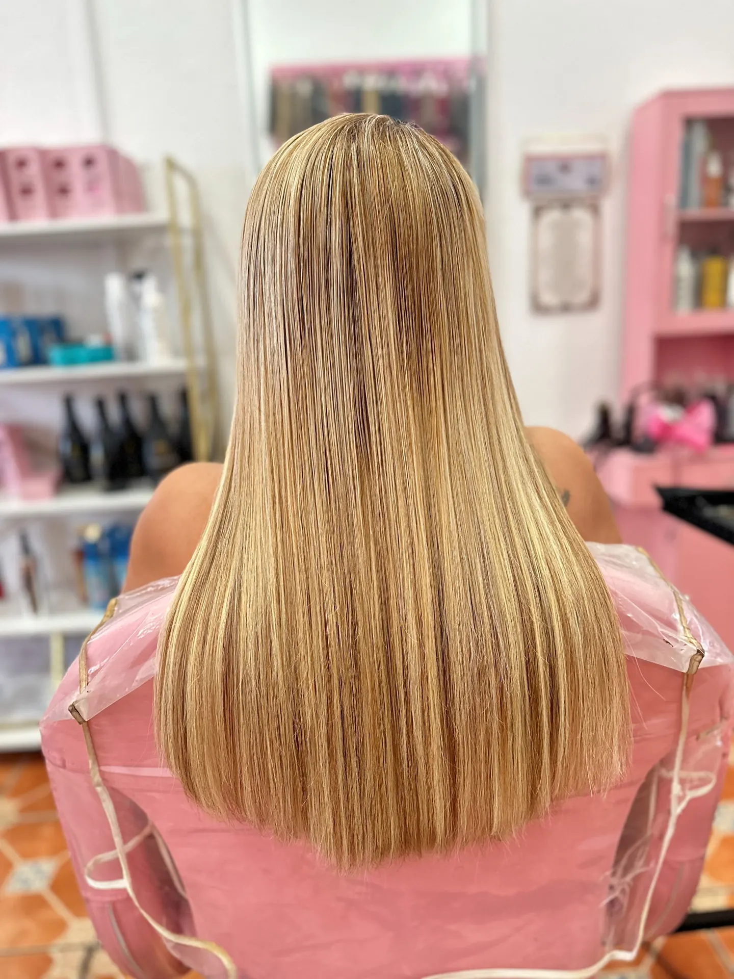 Long blonde hair after nano-tip extensions