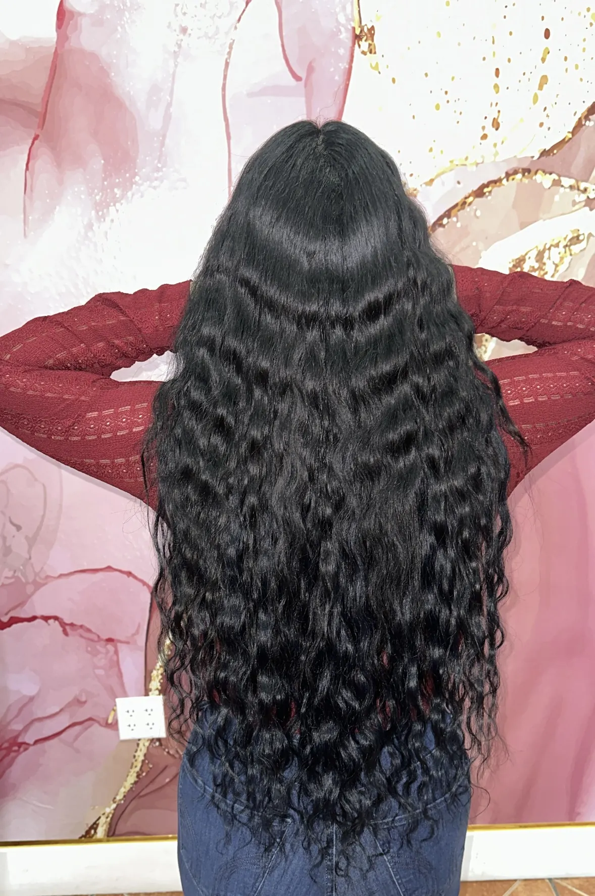 Long curly black tape-in extensions